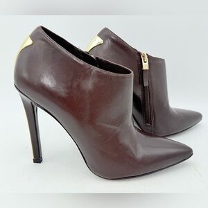 Marciano brown soft leather bootie stilettos with gold accent heels, ankle boots